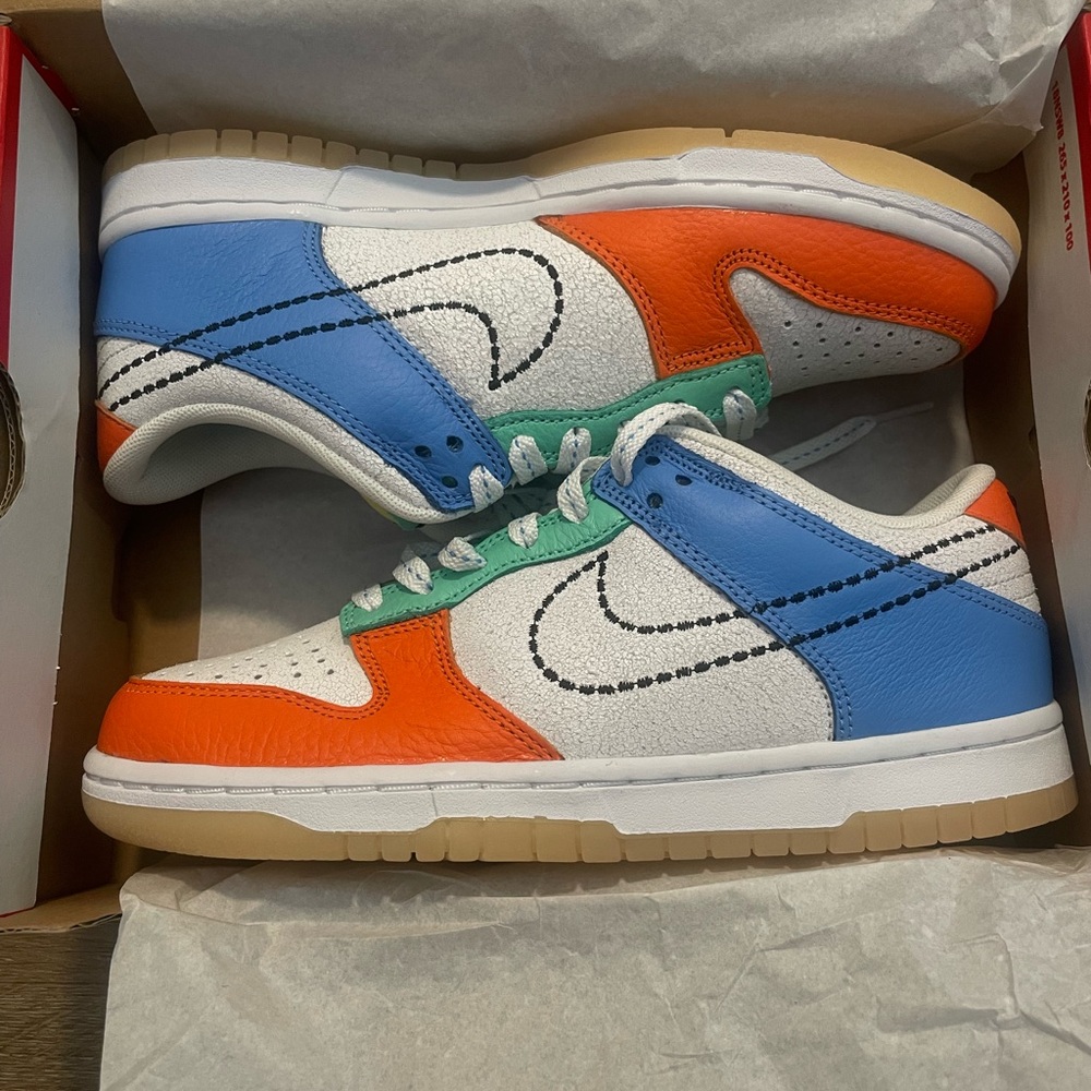 Nike Dunk Low GS in White, Black, and Safety Orange